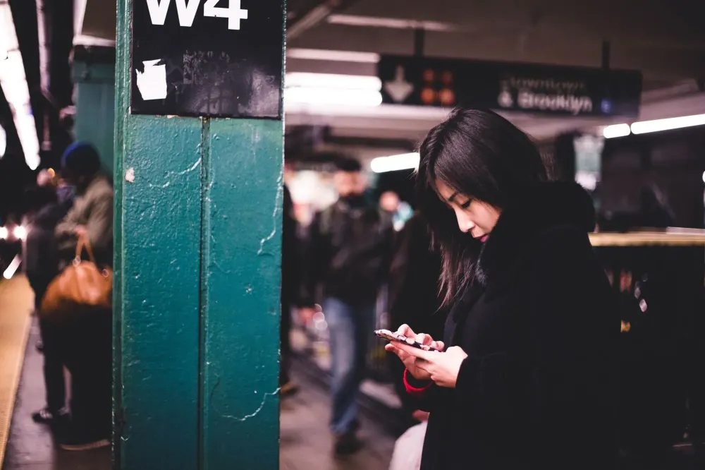 woman on subway platform in new york